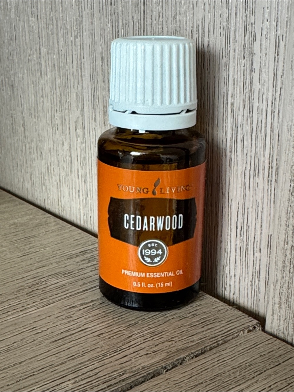 Young Living Cedarwood Essential Oil - Orange and White